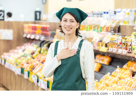 A woman who works at supermarket A woman who works at supermarket 139131909