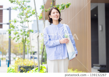Portrait of a housewife returning from shopping 139132267