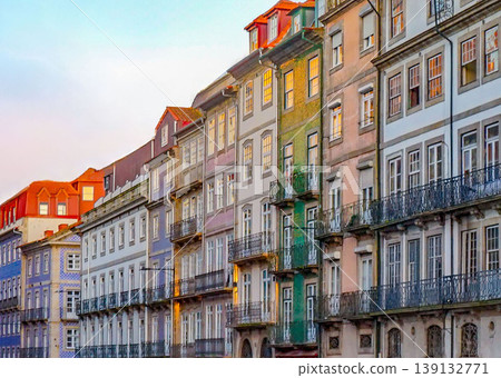 Porto's colorful historical buildings: Cityscape and traditional architecture at sunset, Portugal Porto's colorful historical buildings: Cityscape and traditional architecture at sunset, Portugal 139132771