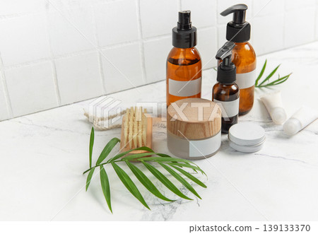 Skincare beauty products on marble with plant leaves Skincare beauty products on marble with plant leaves 139133370