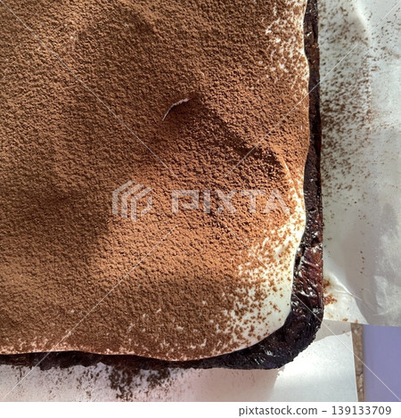 Soft and creamy tiramisu slice layered with rich mascarpone, espresso-soaked ladyfingers, and a dusting of cocoa powder, offering a perfect balance of sweetness and bold coffee flavor in every bite. Soft and creamy tiramisu slice layered with rich mascarpone, espresso-soaked ladyfingers, and a dusting of cocoa powder, offering a perfect balance of sweetness and bold coffee flavor in every bite. 139133709