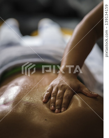 man getting massage at spa 139134159
