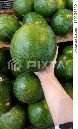 Fresh whole avocado with smooth, dark green skin and rich, creamy texture. Perfect for healthy eating, salads, smoothies, and guacamole. Nutritious, delicious, and full of flavor! Fresh whole avocado with smooth, dark green skin and rich, creamy texture. Perfect for healthy eating, salads, smoothies, and guacamole. Nutritious, delicious, and full of flavor! 139134220