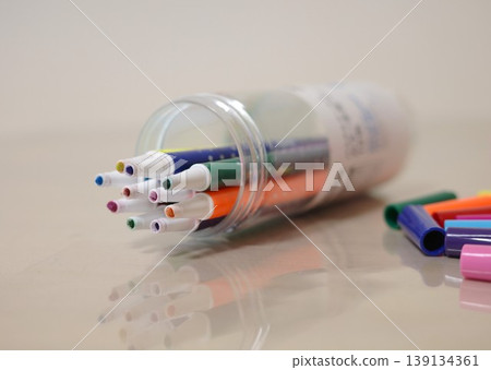 Colored pens with crushed tips from being used by a child. Colored pens with crushed tips from being used by a child. 139134361