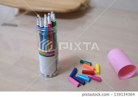 A colored pen with a crushed tip that my child loved to use. 139134364