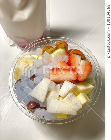 Hwachae, a refreshing Korean fruit punch made with colorful fruits and sweet syrup. Served chilled, it's a delightful treat for hot days, bursting with fruity flavors and vibrant colors. Hwachae, a refreshing Korean fruit punch made with colorful fruits and sweet syrup. Served chilled, it's a delightful treat for hot days, bursting with fruity flavors and vibrant colors. 139134568