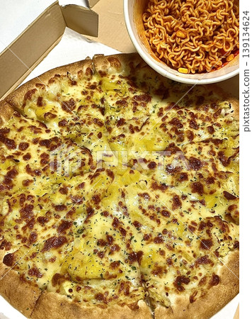 Hot and cheesy pizza slice with a crispy crust and savory toppings. A perfect mix of melty goodness and bold flavor for a satisfying comfort food favorite. Hot and cheesy pizza slice with a crispy crust and savory toppings. A perfect mix of melty goodness and bold flavor for a satisfying comfort food favorite. 139134624