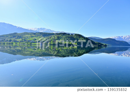 Landscape reflected in Ulvikfjord Landscape reflected in Ulvikfjord 139135832