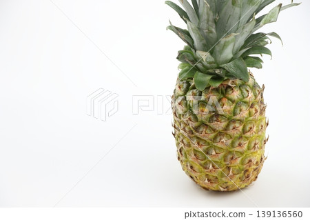 Ripe pineapples are a quintessential taste of summer. Ripe pineapples are a quintessential taste of summer. 139136560