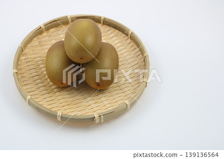 Ripe kiwis served in a traditional bamboo basket Ripe kiwis served in a traditional bamboo basket 139136564