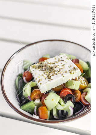 traditional greek feta cheese salad on white table at outdoor cafe in greece traditional greek feta cheese salad on white table at outdoor cafe in greece 139137412
