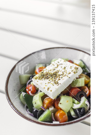 traditional greek feta cheese salad on white table at outdoor cafe in greece traditional greek feta cheese salad on white table at outdoor cafe in greece 139137415