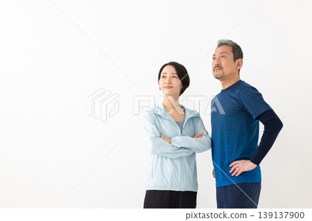 Men and women exercising 139137900