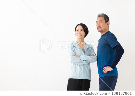 Men and women exercising 139137901