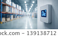 Industrial temperature digital display. A view inside a cold storage warehouse with shelves filled boxes. Gauges display measurements in a large manufacturing facility. Inventory control. Logistic 139138712