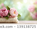 Multicolored knitted flowers banner with free space for text. Pastel blurred garden background. Creative cute modern wool bouquet. Vibrant yarn bloom. Decor projects crafting. Textile craft branding. 139138725