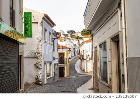 Odemira, Portugal - Feb 24, 2026: Narrow street with old white houses at village Odemira in Portugal Odemira, Portugal - Feb 24, 2026: Narrow street with old white houses at village Odemira in Portugal 139139507