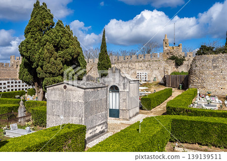 Santiago do Cacem, Portugal - Feb 26, 2026: Castle and Igreja Matriz cemetery in Santiago do Cacem, Alentejo, Portugal Santiago do Cacem, Portugal - Feb 26, 2026: Castle and Igreja Matriz cemetery in Santiago do Cacem, Alentejo, Portugal 139139511
