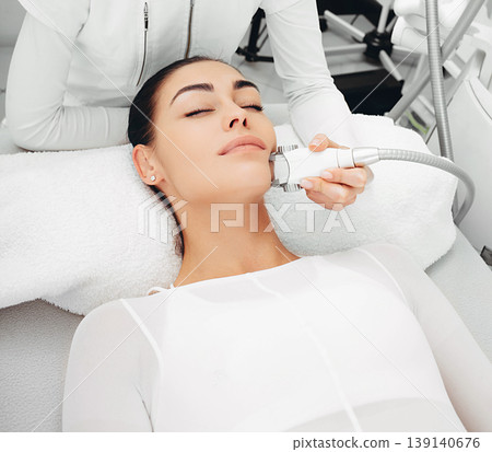 LPG facial massage for extend youthful female skin. Superficial Wrinkle Control Method. Massage encourage circulation and lymphatic drainage and has anti-ageing benefits LPG facial massage for extend youthful female skin. Superficial Wrinkle Control Method. Massage encourage circulation and lymphatic drainage and has anti-ageing benefits 139140676