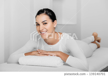 Beautiful happy woman wearing LPG suite after LPG massage 139140701