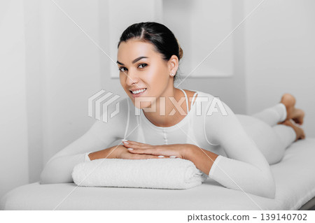 Beautiful happy woman wearing LPG suite after LPG massage 139140702