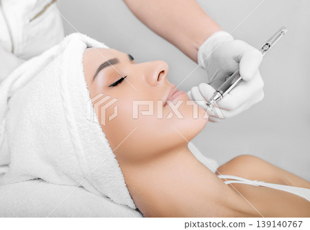 anti-aging face peel, procedure renewing skin , jet peeling 139140767