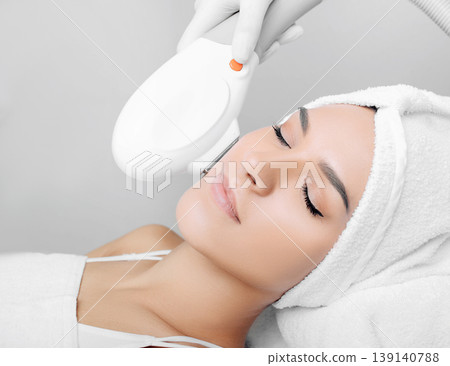procedure of skin rejuvenation , ELOS rejuvenation technology for removes brown spots 139140788
