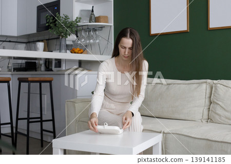 Perfect woman with white jewelry box in white and green interior Perfect woman with white jewelry box in white and green interior 139141185