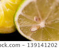 Halves of fresh and juicy lemons . Close up picture 139141202