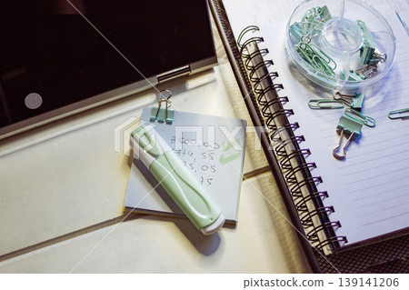 Modern office desk setup showcasing essential stationery representing work, planning, and education Modern office desk setup showcasing essential stationery representing work, planning, and education 139141206