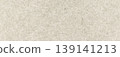Recycled paper texture presenting a subtle grain and natural tone, creating an eco-friendly background 139141213
