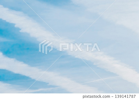 Traces airplane blue sky clouds background abstract lines stripes pattern Traces airplane blue sky clouds background abstract lines stripes pattern 139141787