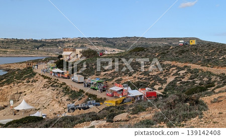A winding road lined with food trucks 139142408