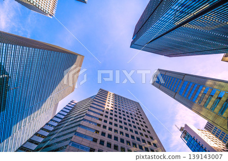 The urban landscape of Tokyo, Japan, is depressing... a sign of the Japanese economy's decline... Otemachi. It's daytime, but the light coming from the side creates shadows and diffuse reflection... = 7th 139143007