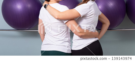 Two women having severe back and neck pain 139143974