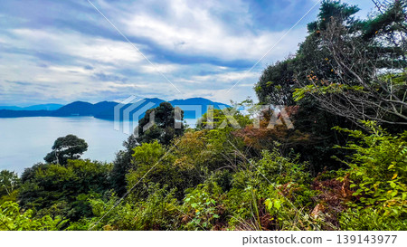 A view of Lake Biwa and the vast sky from Okishima Island in Omihachiman City, Shiga Prefecture. A view of Lake Biwa and the vast sky from Okishima Island in Omihachiman City, Shiga Prefecture. 139143977