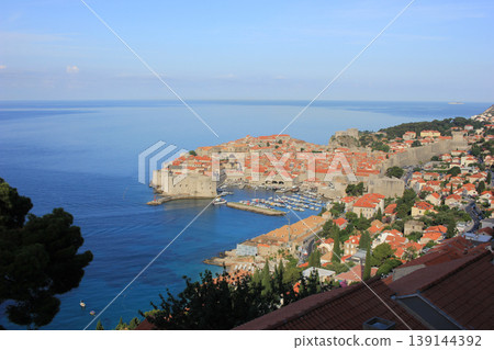 A panoramic view of the Old Town of Dubrovnik, Croatia, and the Adriatic Sea. A panoramic view of the Old Town of Dubrovnik, Croatia, and the Adriatic Sea. 139144392