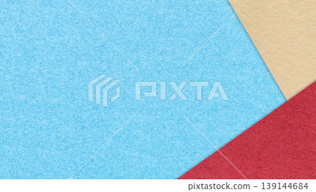Light blue textured paper background with red beige triangular corners and copy space. Template for presentation, banner 139144684