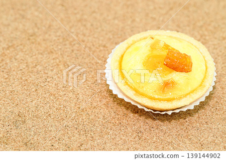variety of bake Hokkaido cheese tart on the wooden background. variety of bake Hokkaido cheese tart on the wooden background. 139144902