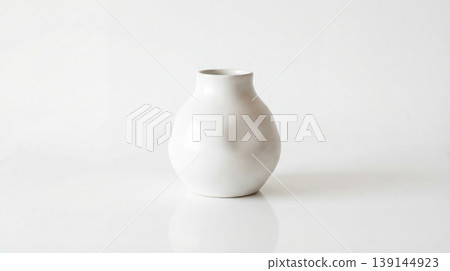 Small white ceramic vase with a minimalist design studio shot on white background still life single object isolated object minimalist container decoration interior isolated contemporary Small white ceramic vase with a minimalist design studio shot on white background still life single object isolated object minimalist container decoration interior isolated contemporary 139144923