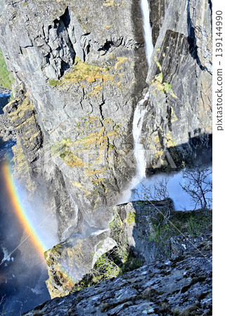 A rainbow over the cascading waters of Vøringsfossen Falls. A rainbow over the cascading waters of Vøringsfossen Falls. 139144990