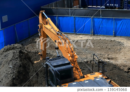 Construction site hydraulic excavator 139145068