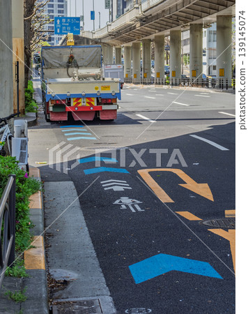 A truck parked on a bicycle lane: A concrete example of a traffic problem that blocks bicycle traffic. A truck parked on a bicycle lane: A concrete example of a traffic problem that blocks bicycle traffic. 139145074
