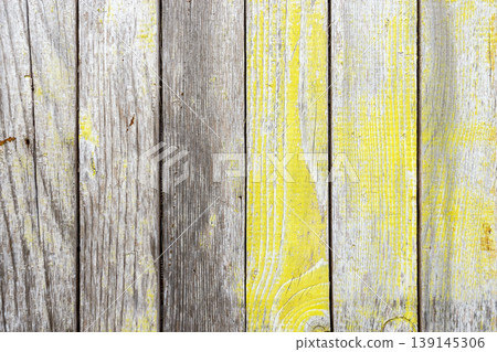 Weathered Wooden Planks Texture with Yellow Paint Background 139145306
