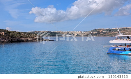 Panoramic view of the Gozo island from Comino island Panoramic view of the Gozo island from Comino island 139145513