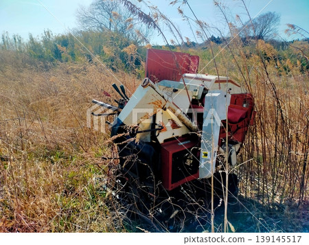 Fallen agricultural machinery Fallen agricultural machinery 139145517