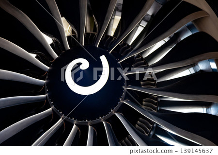 Turbine blades of an aircraft jet engine. Close up Turbines Engine. Aviation Technologies. Aircraft jet black detail during maintenance. Background 139145637