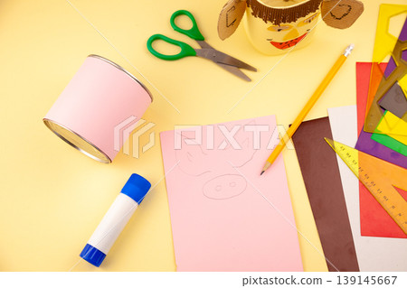 Step 23. Step-by-step instructions on how to make a stand for stationery from recycled materials. Do it yourself. A glass for pencils and pens from a plastic bottle and a can. A fun craft for kids DIY 139145667