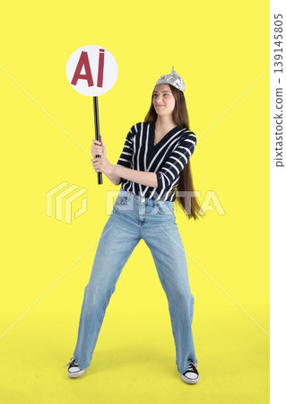 Young woman wearing tin foil hat protesting ai Young woman wearing tin foil hat protesting ai 139145805