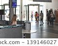 woman with luggage in airport 139146027